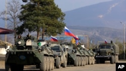 Russian peacekeepers park at a checkpoint on a road in Nagorno-Karabakh in November 2020. 