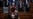 Kosovo's new President Justina Pula receives a bouquet of flowers after being elected in an extraordinary parliamentary session in Pristina.