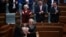 Newly elected as President of Kosovo Justina Pula receives a bouquet of flowers during an extraordinary session in Pristina on October 7, 2026.
