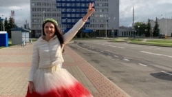 Flag Wars: Woman In White And Red Flees Belarus