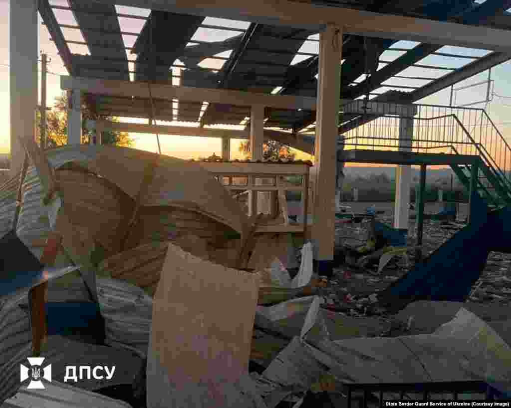 Damage at the Tabaky border crossing between Moldova and Ukraine seen on August 21. Ukraine’s border police say the facility was targeted in a Russian drone strike. The day before the attack, Chisinau reported the explosion of a drone on Moldovan territory near the country's border with Ukraine.