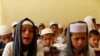 Afghan boys read the Koran at a madrasah or religious school in Kabul. (file photo)