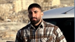 The funeral for Omid Sarlak, a political activist in Iran, was held in Aligoodarz, western Iran, on November 3.