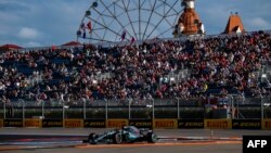 Lewis Hamilton steers his car during the qualifying session for the Russian Grand Prix on September 29.