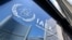 (FILES) Buildings of the International Atomic Energy Agency (IAEA) headquarters reflect in doors with the agency's logo during the IAEA’s Board of Governors meeting in Vienna, Austria on June 13, 2025, where the IAEA’s head Rafael Grossi briefed board mem