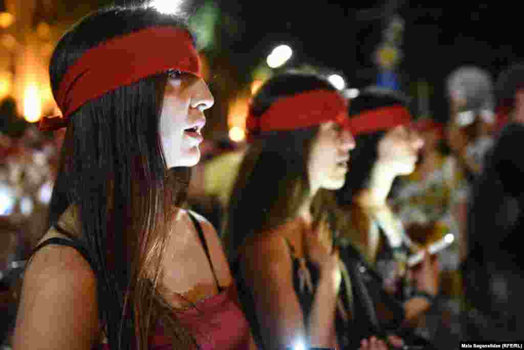 Georgian women take part in an opposition rally near the country&#39;s parliament in Tbilisi on June 26. (RFE/RL/Mzia Saganelidze)