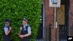 Один из домов, пострадавших в результате поджога