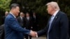 US President Donald Trump shakes hands with Chinese President Xi Jinping after a visit to the Zhongnanhai Garden in Beijing on May 15, 2026.