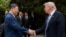 US President Donald Trump shakes hands with Chinese President Xi Jinping after a visit to the Zhongnanhai Garden in Beijing on May 15, 2026.