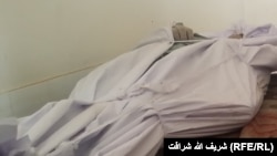 ارشیف، ارزګان کې د یوه وژل شوي کس مړی