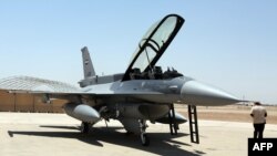 FILE PHOTO - An F-16 fighter jet from the US is seen on the tarmac at Iraq's Balad air base in the Salaheddin province, north of the capital Baghdad, July 20, 2015