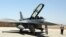FILE PHOTO - An F-16 fighter jet from the US is seen on the tarmac at Iraq's Balad air base in the Salaheddin province, north of the capital Baghdad, July 20, 2015