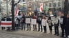 Belarusians protest outside the Skoda offices in downtown Prague.