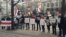 Belarusians protest outside the Skoda offices in downtown Prague.