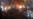 TOPSHOT - This video grab taken on January 14, 2026 from UGC images posted on social media on January 9, 2026 shows cars set on fire during a protest on Saadat Abad Square in Tehran.