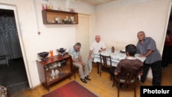 Armenia - Relatives of truck driver Hrachya Harutiunian gather in his house in Yerevan to discuss his arrest related to a deadly bus crash near Moscow, 17Jul2013.