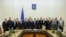 Ukraine -- New prime minister Arseny Yatseniuk (10th R) and his ministers pose for a picture during a meeting in Kyiv, February 27, 2014