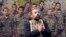 A priest conducts a baptism ceremony for ethnic Armenian soldiers in a military camp near the front line in Nagorno-Karabakh on November 2.