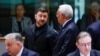 Ukrainian President Volodymyr Zelenskyy (center left) speaks with European Council President Antonio Costa (center right) as they attend a European Union leaders' summit in Brussels, Belgium, December 18, 2025.