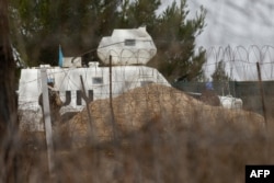 United Nations peacekeepers are seen positioned along the Israeli-Lebanese border after the cease-fire deal went into force on November 27.