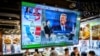 A TV screen showing preliminary results for the U.S. presidential election hangs in a restaurant in Hong Kong on November 6. 