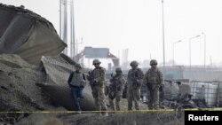 NATO-led International Security Assistance Force (ISAF) soldiers in Afghanistan.