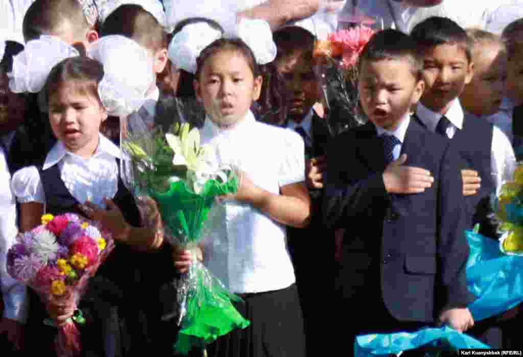 Children at School No. 141 singing the national anthem in Almaty, Kazakhstan. 