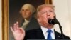 U.S. President Donald Trump speaks about Iran and the Iran nuclear deal in front of a portrait of President George Washington in the Diplomatic Room of the White House in Washington, U.S., October 13, 2017.