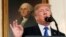 U.S. President Donald Trump speaks about Iran and the Iran nuclear deal in front of a portrait of President George Washington in the Diplomatic Room of the White House in Washington, U.S., October 13, 2017.