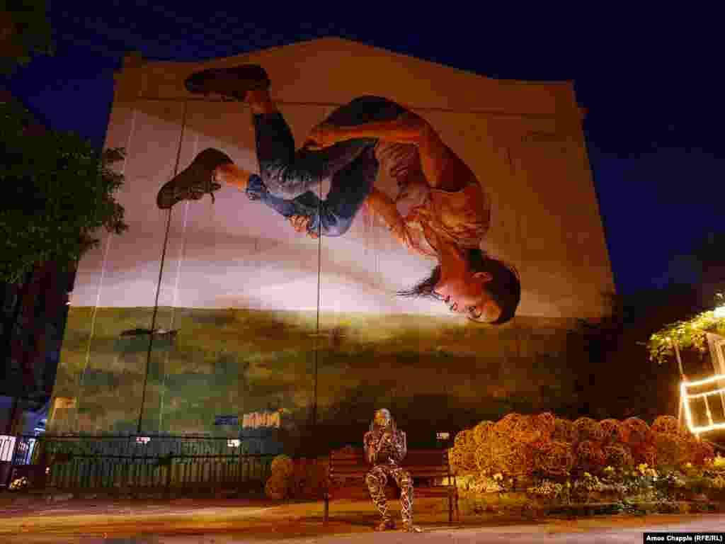 The Dreamer, by Fintan Magee, is a portrait of Ukrainian gymnast Hanna Rizatdinova, who is from Crimea but now based in Kyiv. Of Russia's forcible annexation of the peninsula in early 2014, Rizatdinova says, "I could not understand why. How can the Cri­mea be Russia? How can our Simferopol school train under a Rus­sian flag? I was outraged."