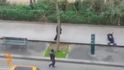 Amateur Video Shows Gunmen Shooting Policeman In Paris