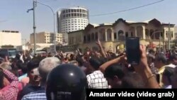 Crowds shouting "Death To The Dictator" as protests spread to several Iranian cities in August.