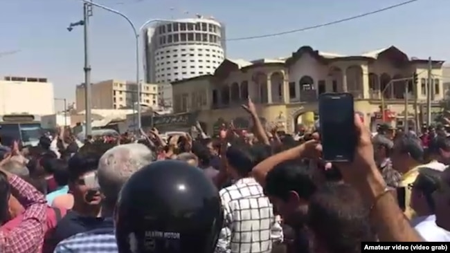 Crowds shouting "Death To The Dictator" as protests spread to several Iranian cities in August.
