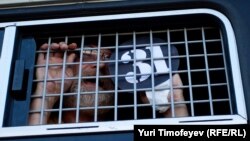 Задержанный участник акции "Стратегии-31" в защиту свободы собраний 31 июля 2012 года 
