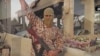 Парсыша сөйлеген "Ислам мемлекеті" экстремистік тобы мүшесі түскен видеодан скриншот.