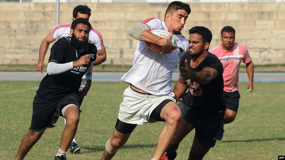 Mustafa Sadat (center) plays in a rugby tournament in Lahore, Pakistan in October 2011.