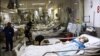 وزیر بهداشت ایران: بیمارستان‌ها گروگانگیری متوفیان را پایان دهند