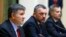 Acting Interior Minister Arsen Avakov speaks alongside acting Prosecutor-General Oleh Makhnytsky, and Ukrainian Security Service (SBU) chief Valentyn Nalyvaychenko (left to right) at a news conference in Kyiv on April 3.