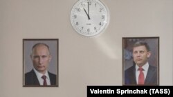 Президент России Владимир Путин и убитый глава "ДНР" Александр Захарченко