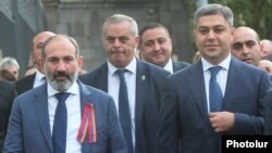 Armenia -- Prime Miinister Nikol Pashinian and National Security Service Director Artur Vanetsian (R) walk in downtown Yerevan, September 21, 2018.