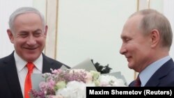 Москва- рускиот претседател Владимир Путин со цвеќе го пречека израелскиот премиер Бенјамин Нетанјаху, 30.01.2020