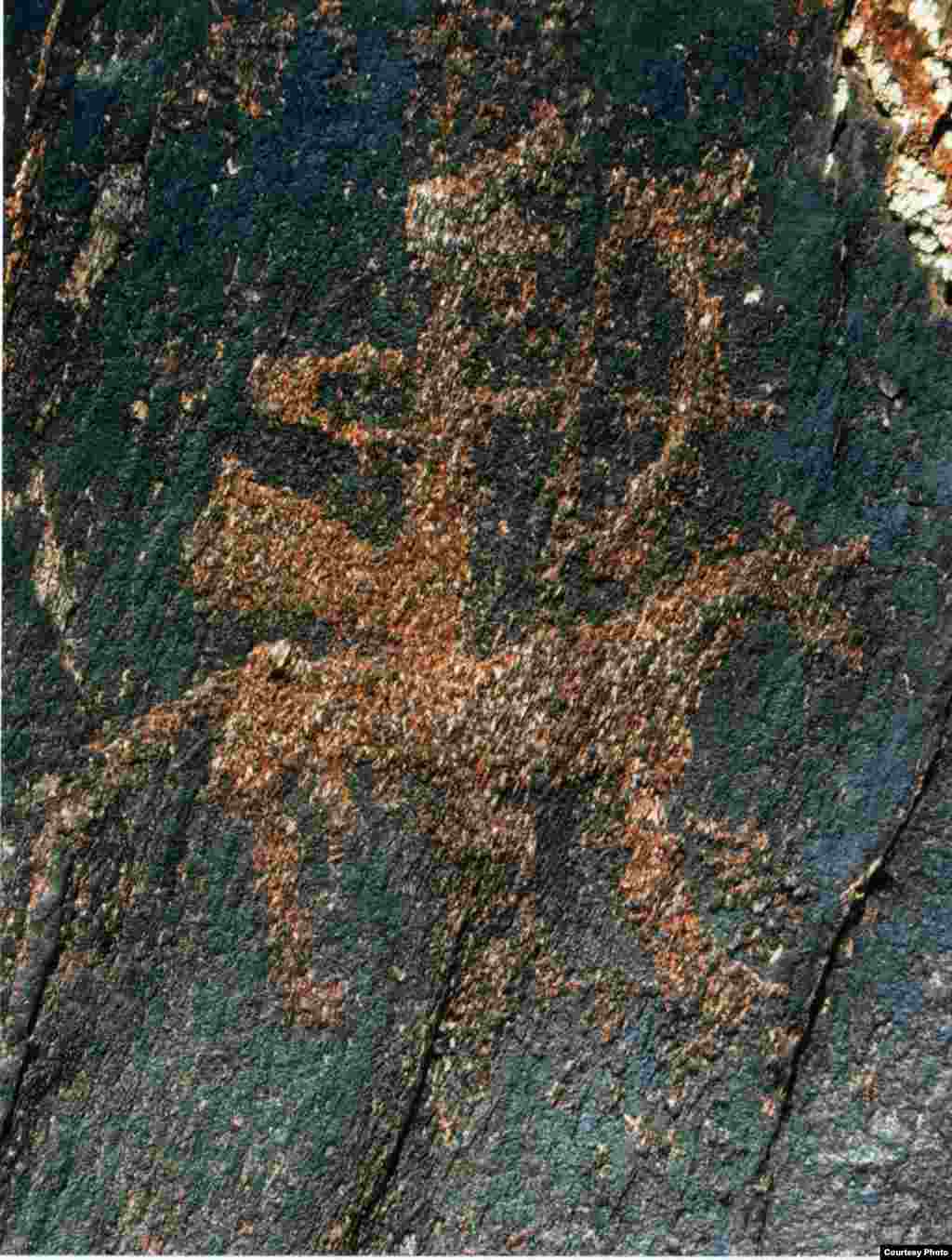 Приручив лошадь, я оседлал ее. - Kazakhstan – Ancient petroglyphs that suggest domestication of horses on territory of Northern Kazakhstan, photo #5 from "Shynghystaw Petroglyphs" by Mukhtar Magauin