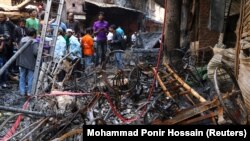 Завалена після пожежі будівельними конструкціями вулиця в районі Чавкбазар, Дакка, Бангладеш, 21 лютого 2019 року