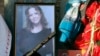 Iryna Nozdrovska is seen in a photograph that was placed near her coffin in her hometown of Demydiv on January 9.