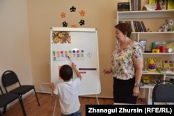 A boy who was evacuated from Syria takes part in a lesson in a rehabilitation center in Aqtobe in northwestern Kazakhstan. (file photo)