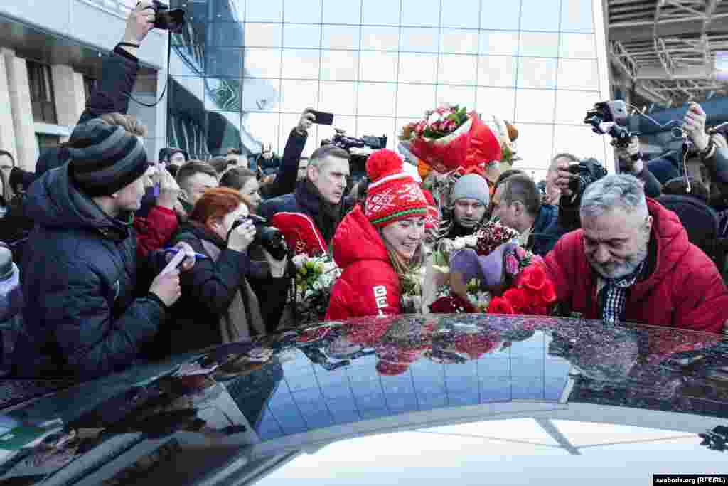 Dzinara Alimbekava, a gold medalist in the women's relay biathlon at the 2018 Winter Olympics, returns home to Belarus from Pyeongchang on February 27. The national team of Belarus won two gold medals and one silver. (RFE/RL)