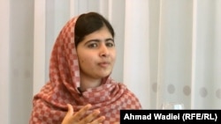 Malala Yousafzai conversing with Abdul Hai Kakar from RFE/RL's Radio Mashaal.
