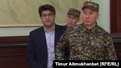 Quandyq Bishimbaev (left) in court in Astana in January