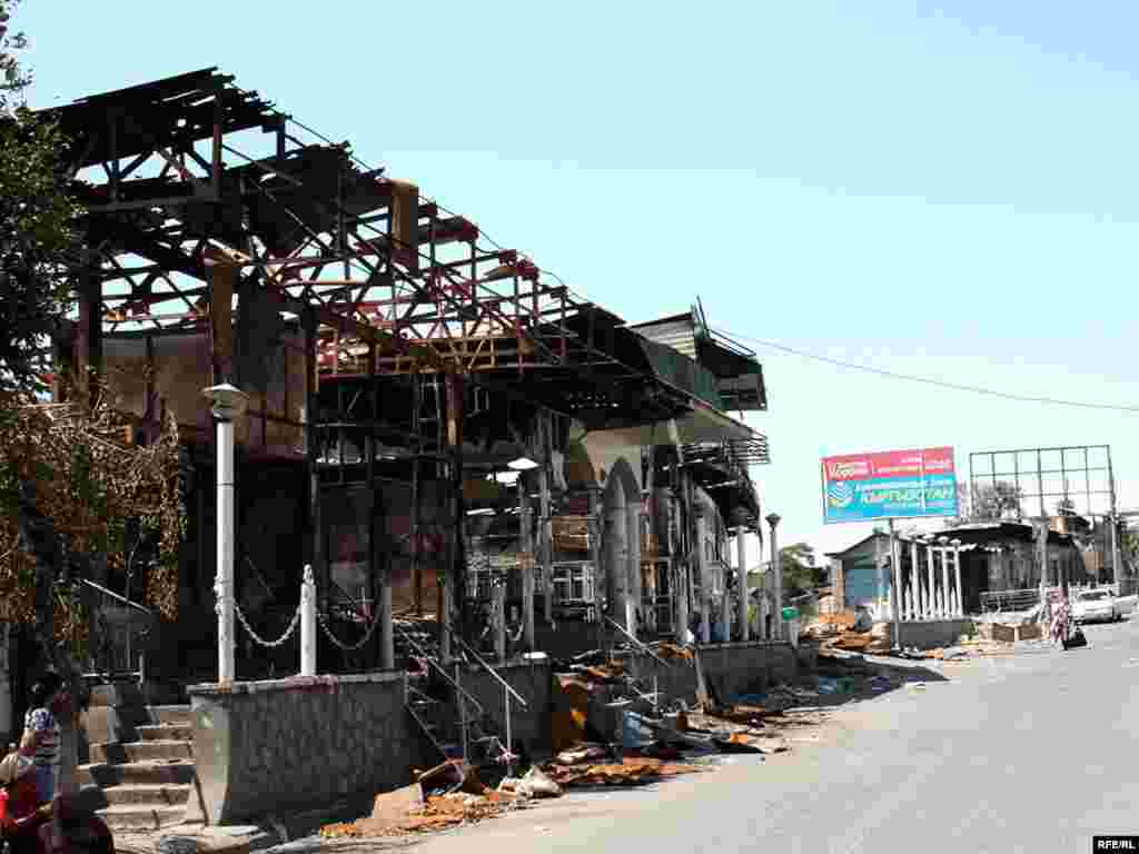 Burned-out stores in Osh city center