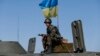 Ukrainian Adversaries Sign Cease-Fire 